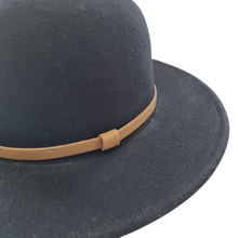 Load image into Gallery viewer, A black hat with a wide sewn brim, a elegant thin tan band and made from 100% Australian wool